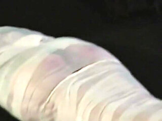 Barefoot Astrid Gets Mummified with White Bandages and Gagged Tightly