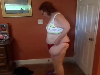 Strip and masturbate with just my red thongs on