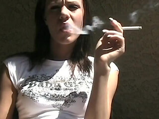Smoking fetish with a teen brunette