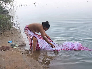 Indian Village Wife Bathing in the River in Outdoor Area