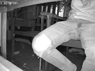 Amateur boy caught on night vision cam peeing himself sitting at the garden table (he totally wets his pants) )
