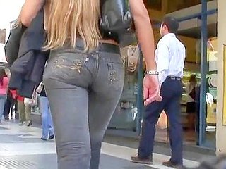 Long hair blonde in tight jeans candid street video