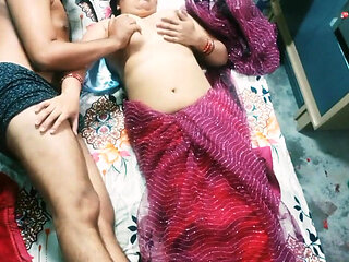 Beautiful Indian Bhabhi in Red Colour Saree.