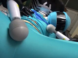 Wearing a helmet while few people use toys on her