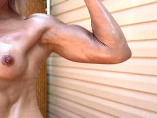 Lora Cross Flexes Her Muscles for Cj