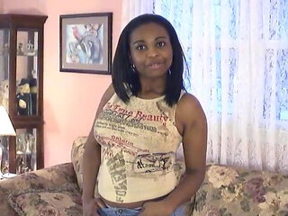 Chubby black chick shows off her large ass