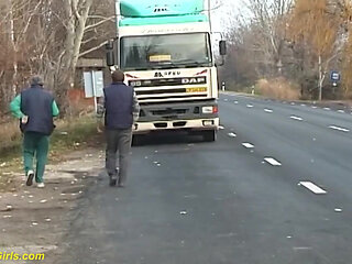Nylon woman peeing on street