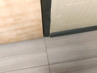Jerking and cumming in public bathroom hallway