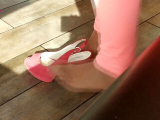 Shoeplay with High Heels in a Bar