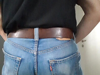 My jeans-butt riding the face of my sitting-doll