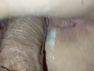 Tracing mature mother's tail from behind