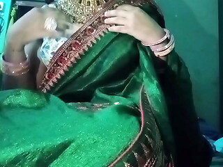 Indian Gay Bottom Crossdresser Gaurisissy pressing his boobs so hard with heavy jwellery in green Saree real xxx sex