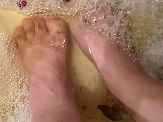 Washing my feet with rose petals and herbs after a HARD day of work