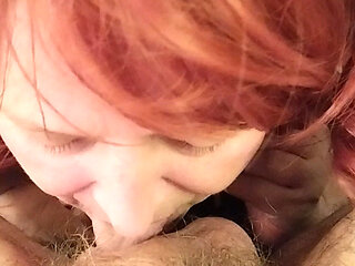Mature Redhead Enjoys Licking Cock