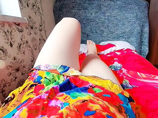 Lovely sissy lying sideways with playful hair twirl