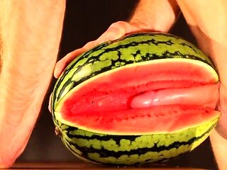 Muscular Stud Fucks and Cums on Watermelon