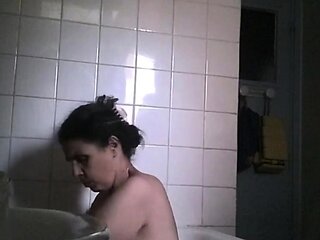 big boobed stepmom spied in the bathroom