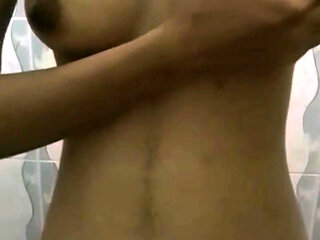 Desi hot girl taking bath and fingering herself