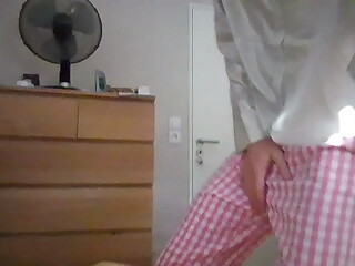 Sexy crossdresser secretary in Gingham pink pants