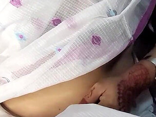 Beautiful Bangladeshi girl wearing a saree showing off her beautiful figure