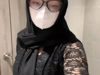Sexy kebaya hijab playing in the toilet