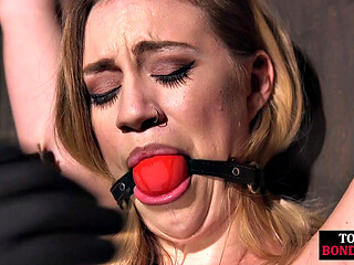 Mouthgagged skinny babe in electrosex gets rough treatment