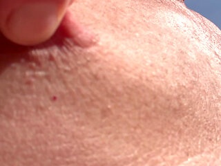 Enjoying the sun outside with my shaved cock