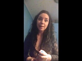 Busty mature woman playing with the cream all around her