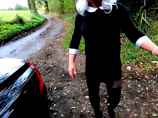 Amateur crossdresser Kellycd2022 in black dress and pantyhose outdoors