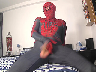 Spiderman wanking his erect cock and cumming with a big cumshot