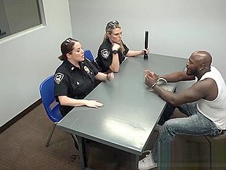 A black stud is under interrogation by two horny and bu...