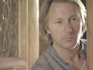 Husband Watches Wife with Doctor