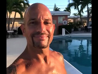 HAPPY GUY BY THE POOL