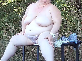 a friend in the park undresses and masturbates on a bench