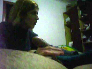 young blonde gives a handjob on friend until he cums