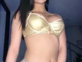 Busty curly brunette with big boobs fucks on couch