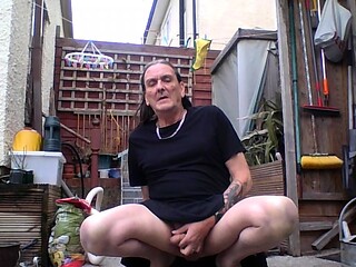Me walking in maids outfit in garden