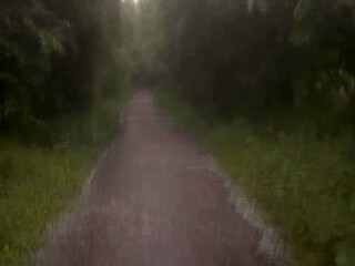 Long naked barefoot walk from car to a welcome to my town sign