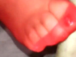 Cum on the nylon soles of a hot MILF