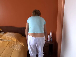 Beautiful Latin stepmother trying on erotic lingerie while stepson records her and masturbates