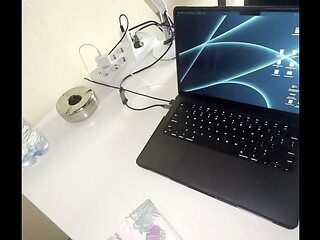 Cuming in my office , people passing by in the road .