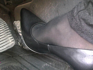 Pedal Pumping in Black Pantyhose and Grey Patent High Heels