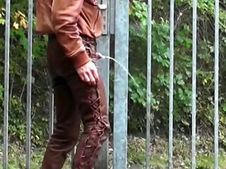 pissing in brown leather