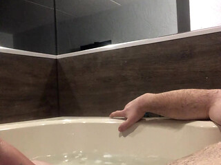 Flab fun in a jacuzzi! Slim n sexy Rachel Wriggler has slippy sliding soapy fun with a big chubby bear