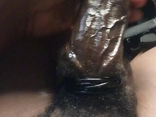 Man masturbate black cock with veins