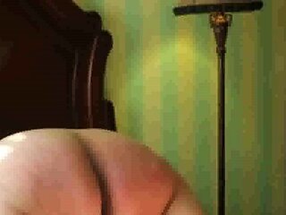 Lashing slut Mary's fat old ass with the belt