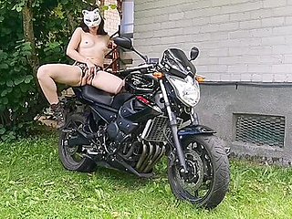 Milf Naked Grinds On The Seat Of The Motorbike With Her...