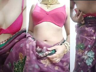 Indian Gay Crossdresser Bottom Gaurisissy showing her big boobs in purple saree