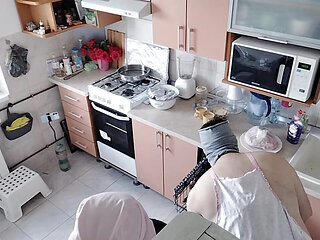Hot amateur couple having fun in the kitchen.