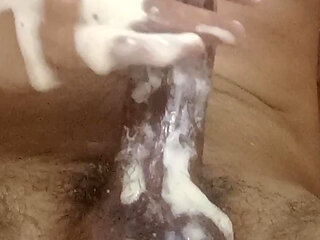hot boy uses soap on his big cock and big balls stroking his full length and having big orgasm